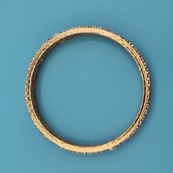 Gold Toned Textured Pattern Bracelet With Rubies And Coloured Faceted Stones - Picture 8 of 10